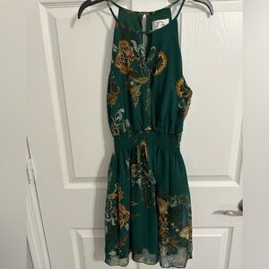 Green mini dress with orange flowers